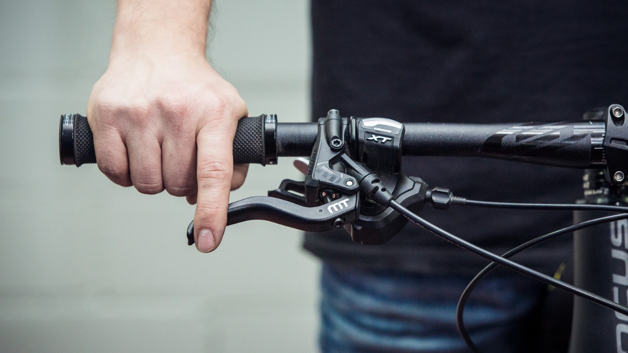 how to adjust rear brakes on a mountain bike